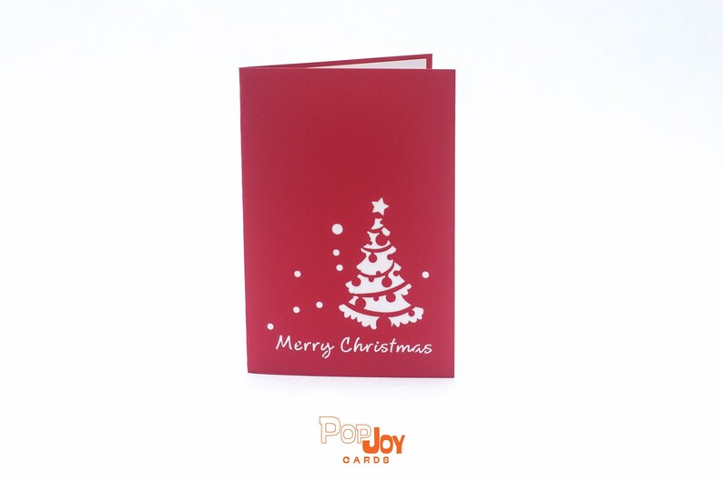 Christmas Tree Decorating 3D pop-up card by PopJoy Cards - front cover with Merry Christmas