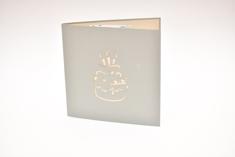 Birthday Cake pop-up card front cover with candles outline