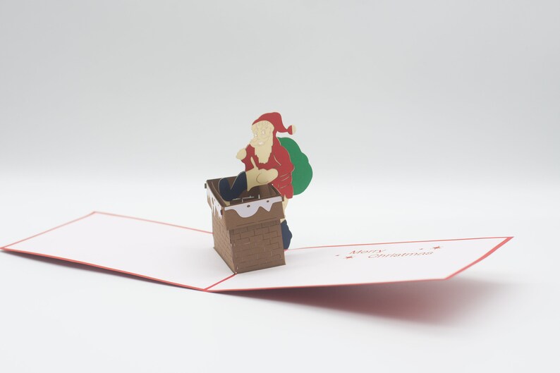 Santa comes down the Chimney 3D pop-up card by PopJoy Cards - detail of Merry Christmas cutout