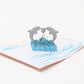 Pink Dolphin 3D pop-up card by PopJoy Cards - open view, studio shot