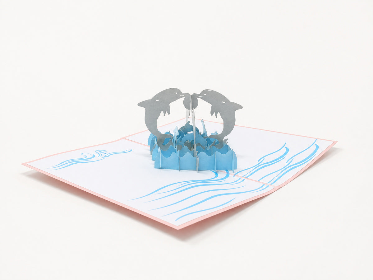 Pink Dolphin 3D pop-up card by PopJoy Cards - open view, studio shot