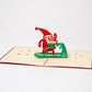 Exercising Santa 3D pop-up card by PopJoy Cards - open view, studio shot