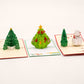 Holiday Pack of 3 Christmas Tree pop-up cards (Vol 1) by PopJoy Cards - open view, studio shot