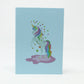 Unicorn pop-up card open showing rainbow bridge