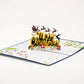 Merry Christmas 3D pop-up card by PopJoy Cards - open view, studio shot