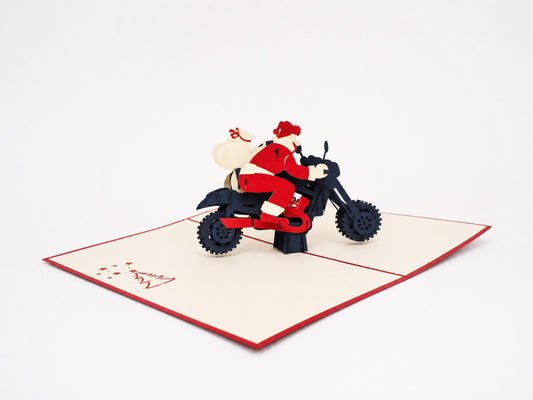 Motorcycle Santa 3D pop-up card by PopJoy Cards - open view, studio shot