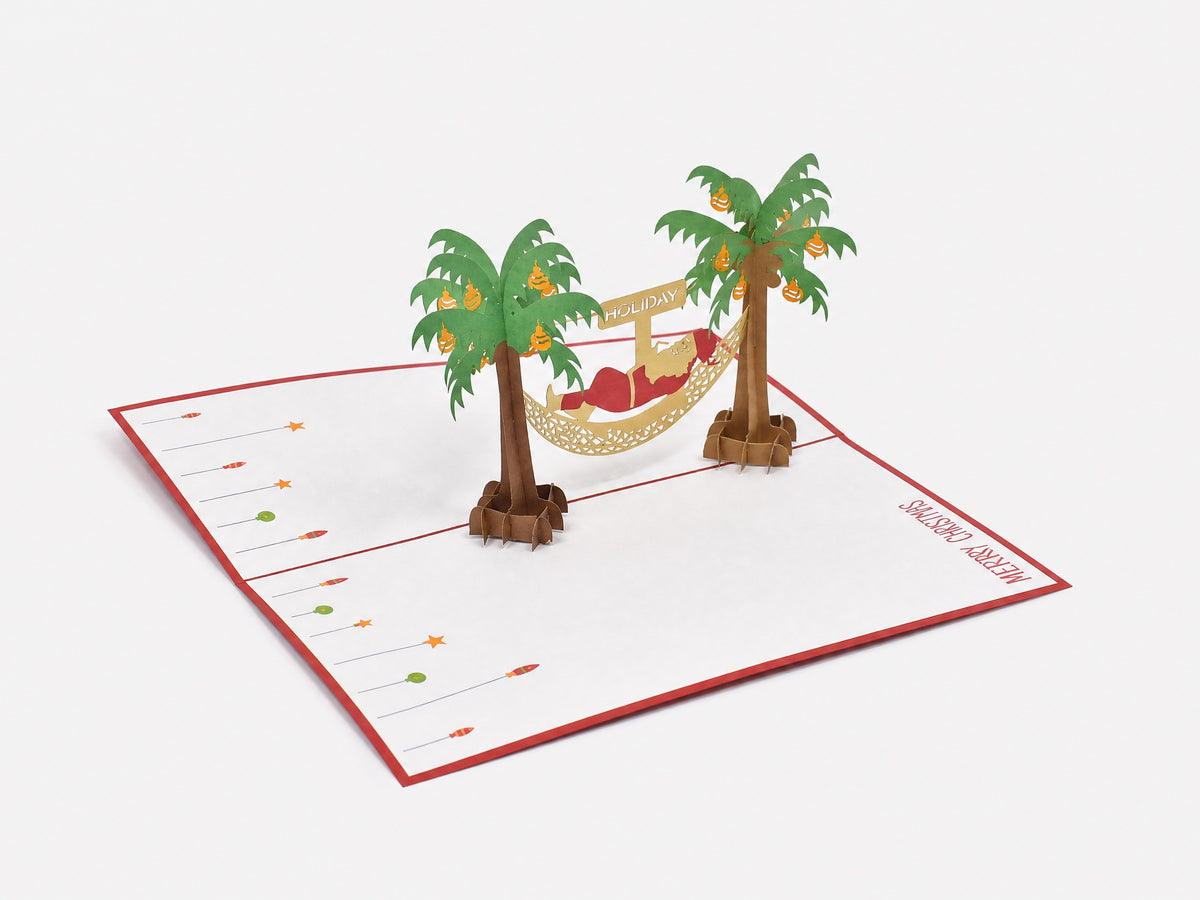 Santa on Vacation 3D pop-up card by PopJoy Cards - open view, studio shot