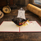 Viking Pirate Ship 3D pop-up card by PopJoy Cards - lifestyle scene