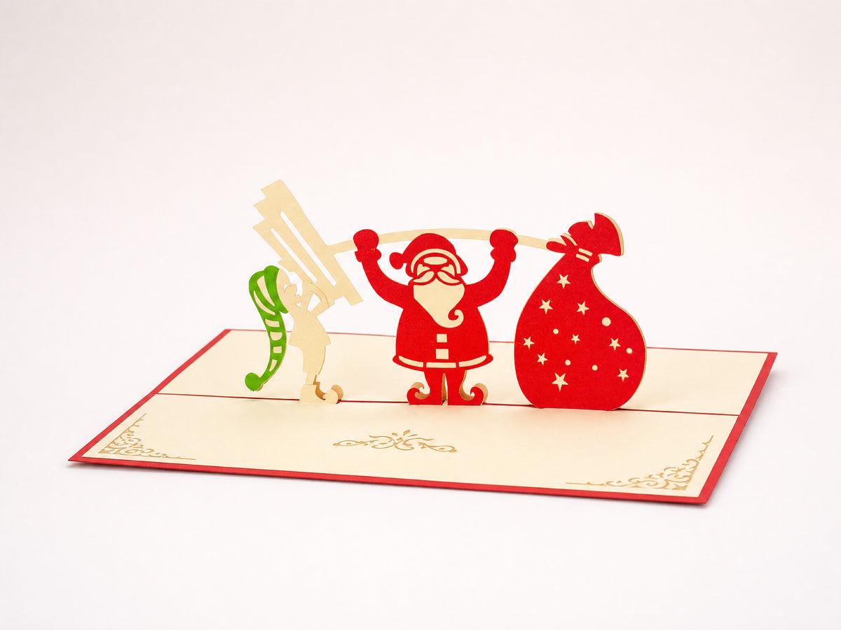 Weightlifting Santa 3D pop-up card by PopJoy Cards - open view, studio shot