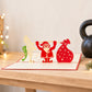 Weightlifting Santa 3D pop-up card by PopJoy Cards - lifestyle scene