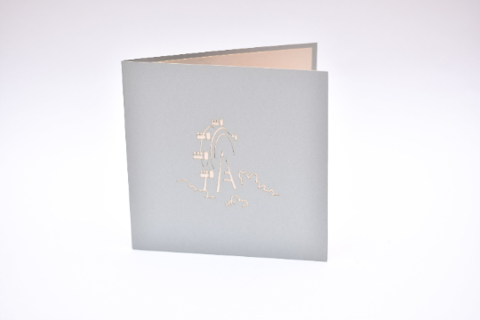 Light grey card with Ferris wheel etched in white