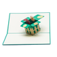 Pop-up card showing garden box lined with picket fence and filled with bright dandelions