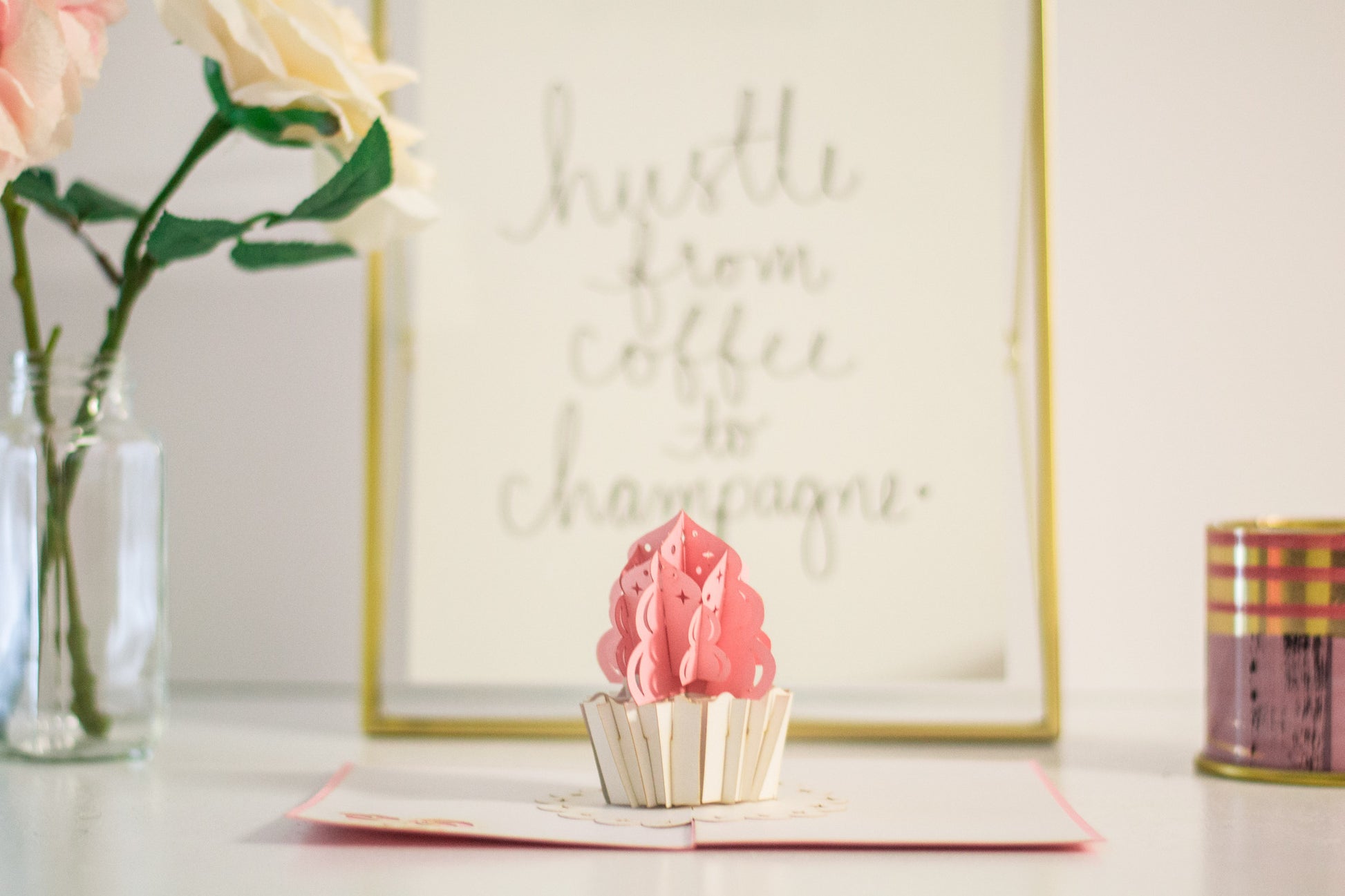Open pop-up card showing pink cupcake