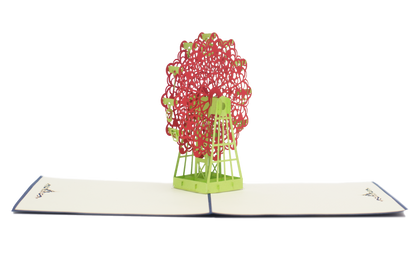 Pop-up card showing a detailed red Ferris wheel with green structure and seats
