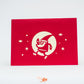 Red card showing Santa going for a jog in the night