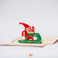 Pop-up card showing Santa exercising on the treadmill
