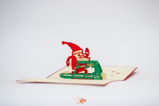 Pop-up card showing Santa exercising on the treadmill