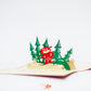 Pop-up card with Santa skiing down the slopes