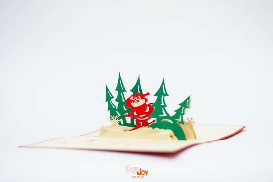 Pop-up card with Santa skiing down the slopes